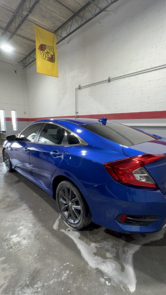 Vehicle after collision repair with restored aluminum and metal body panels, smooth finish